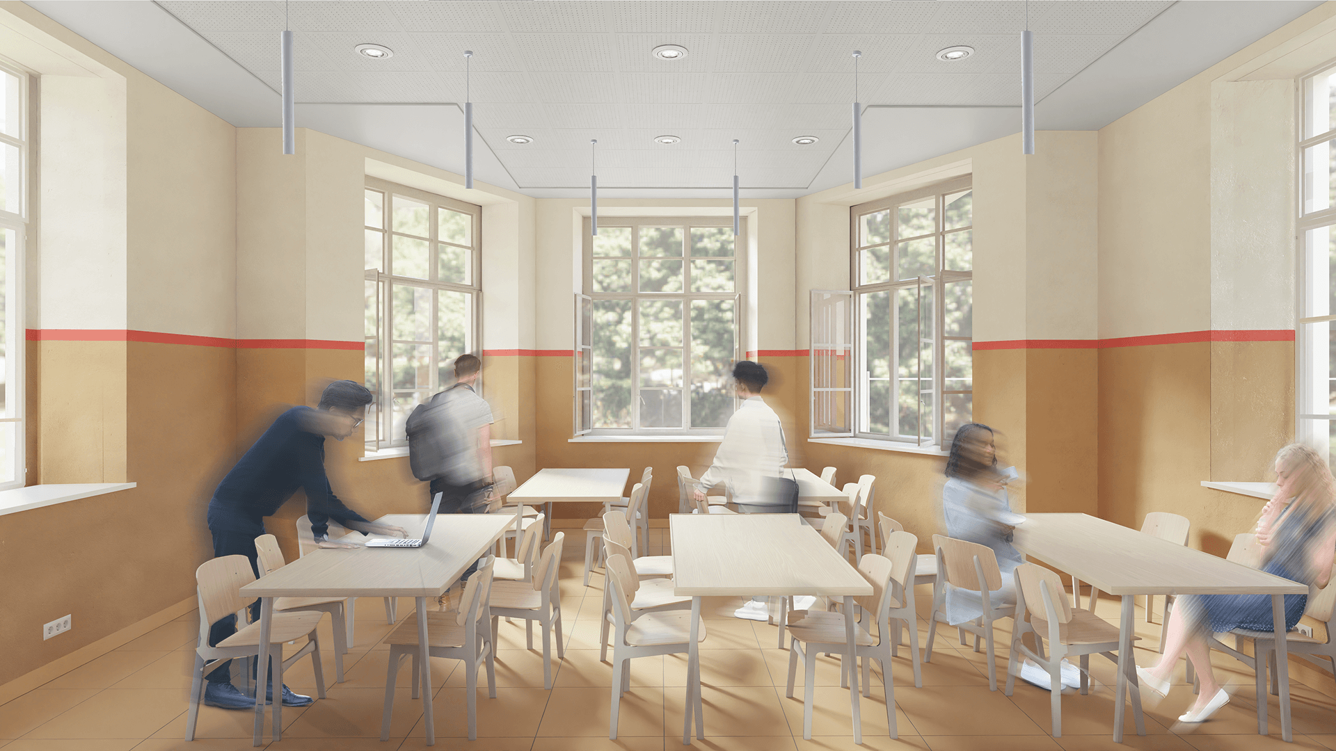 L'immagine rappresenta un ambiente luminoso, probabilmente una sala comune o una zona ricreativa di una scuola o di una residenza. Il design dell'interno è caratterizzato da pareti con due tonalità: una parte inferiore color terracotta e una superiore di un beige chiaro, interrotte da una linea rossa che corre lungo tutto il perimetro, dando un tocco di vivacità all'ambiente. Il pavimento è in piastrelle beige, mentre il soffitto è dotato di luci a soffitto moderne. La stanza è arredata con tavoli di legno chiaro e sedie abbinate, in stile semplice ma elegante. Le finestre grandi permettono alla luce naturale di entrare, creando un'atmosfera accogliente e ventilata, con diverse finestre aperte che consentono la circolazione dell'aria. Diverse persone sono visibili, in movimento, mentre interagiscono con l'ambiente: un giovane lavora su un computer portatile, altri sono in movimento e si spostano per la stanza. La scena, piena di vita e di energia, suggerisce un ambiente funzionale, perfetto per attività di gruppo, studio o relax, con una piacevole connessione visiva con l'esterno, grazie alla vista sul giardino o sul cortile circostante.