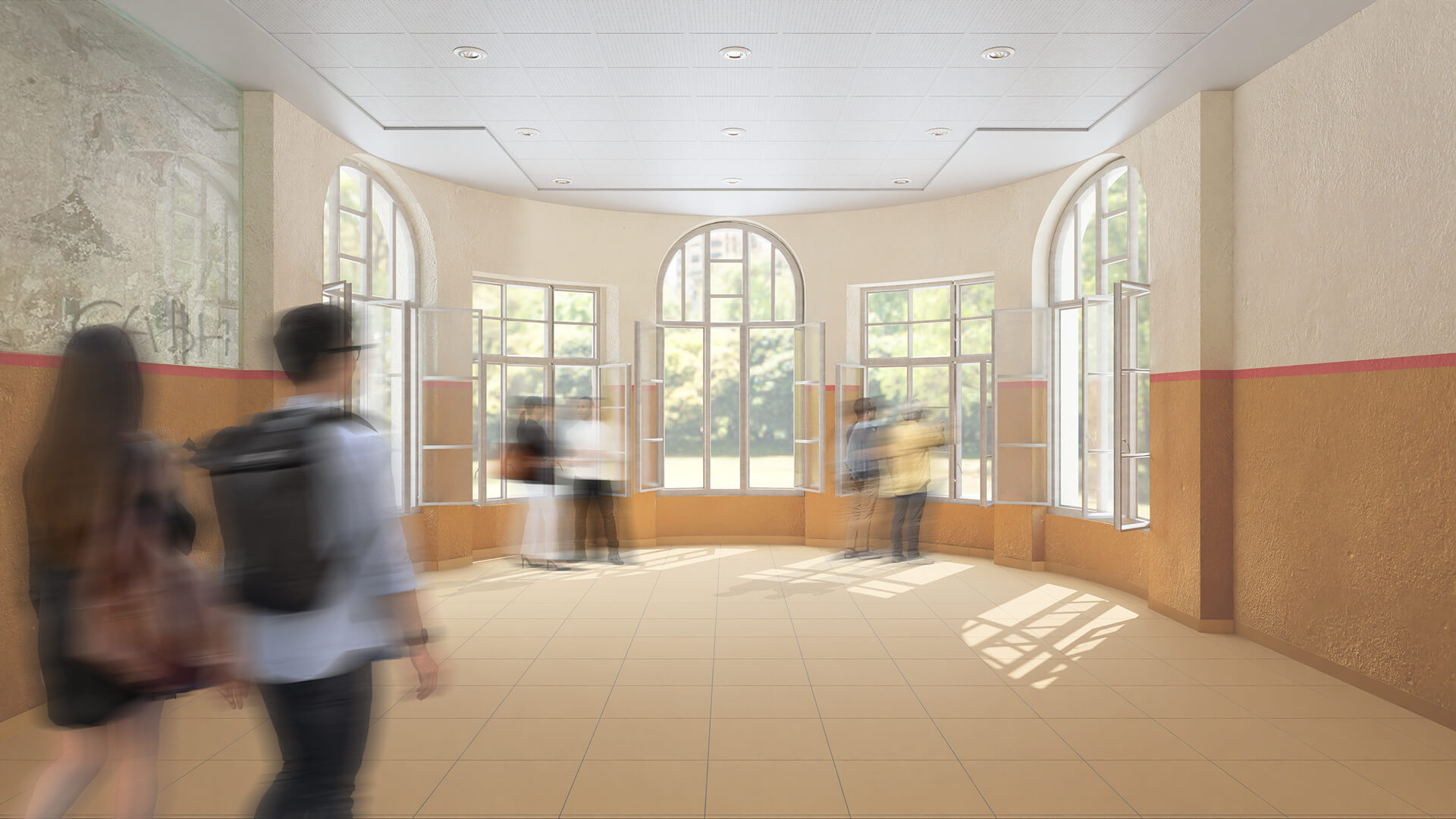 L'immagine mostra un ampio corridoio luminoso con pareti in due tonalità di colore: una più chiara nella parte superiore e una più scura nella parte inferiore, con una linea di demarcazione rossa. Le pareti, sebbene ben curate, mantengono un carattere antico, come visibile dal rivestimento che lascia intravedere tracce di decorazioni precedenti. La zona inferiore è rivestita con piastrelle beige e la luce naturale entra abbondantemente grazie alle ampie finestre arcuate, che creano un'atmosfera accogliente e luminosa. L'ambiente è movimentato da diverse persone in movimento, sfocate per dare una sensazione di dinamismo, mentre alcune finestre sono aperte, permettendo all'aria fresca di entrare e migliorando l'atmosfera vivace e vivibile. La luce solare che entra dalle finestre proietta ombre nette sul pavimento, accentuando la sensazione di profondità e spazio. Questo tipo di ambiente suggerisce che la zona sia un corridoio di un istituto o di una residenza, dove persone si spostano da un luogo all'altro.