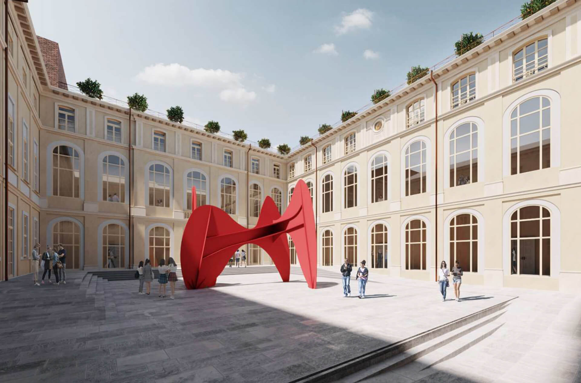 Corte interna di edificio storico riqualificato, caratterizzata da facciate intonacate scandite da aperture ad arco e finestre regolari disposte su più livelli, con cornici e marcapiani che definiscono un impianto architettonico di impianto storico. Al centro dello spazio aperto è collocata una grande scultura contemporanea di colore rosso con forma organica, posta su pavimentazione in pietra, mentre il cortile è circondato da prospetti con grandi serramenti vetrati che suggeriscono il riuso funzionale degli ambienti interni. La presenza di persone e arredi urbani indica la nuova destinazione pubblica dello spazio, evidenziando il dialogo tra architettura storica restaurata e inserimenti contemporanei.